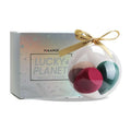 Clear spherical ornament containing three multicolored hydrophilic polyurethane beauty egg makeup sponges in pink green and beige