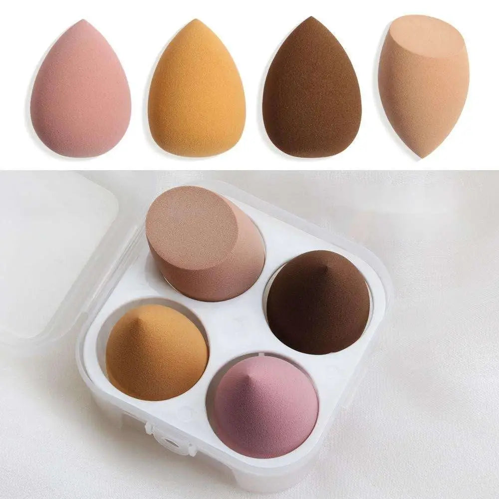 Set of four teardrop-shaped multicolored beauty egg makeup sponges in hydrophilic polyurethane foam material