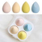 Set of four pastel-colored teardrop beauty egg makeup sponges made of hydrophilic polyurethane in a clear case