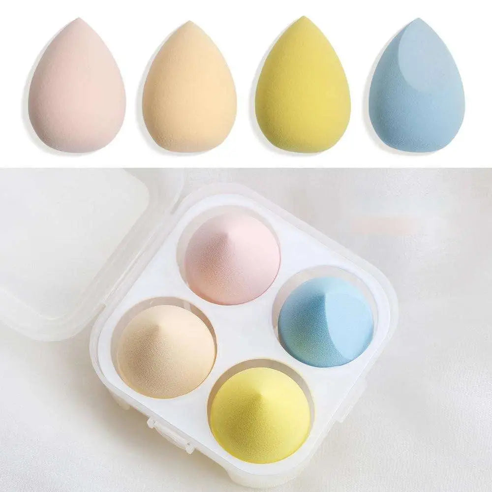 Set of four pastel-colored teardrop beauty egg makeup sponges made of hydrophilic polyurethane in a clear case
