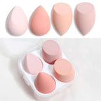 Set of five pastel pink and peach hydrophilic polyurethane beauty egg makeup sponges in clear plastic case