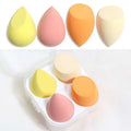 Set of four pastel beauty egg makeup sponges in yellow pink orange and beige made of hydrophilic polyurethane