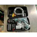 Multifunctional car wash pressure water gun in teal with black accents and clear plastic protective carrying case