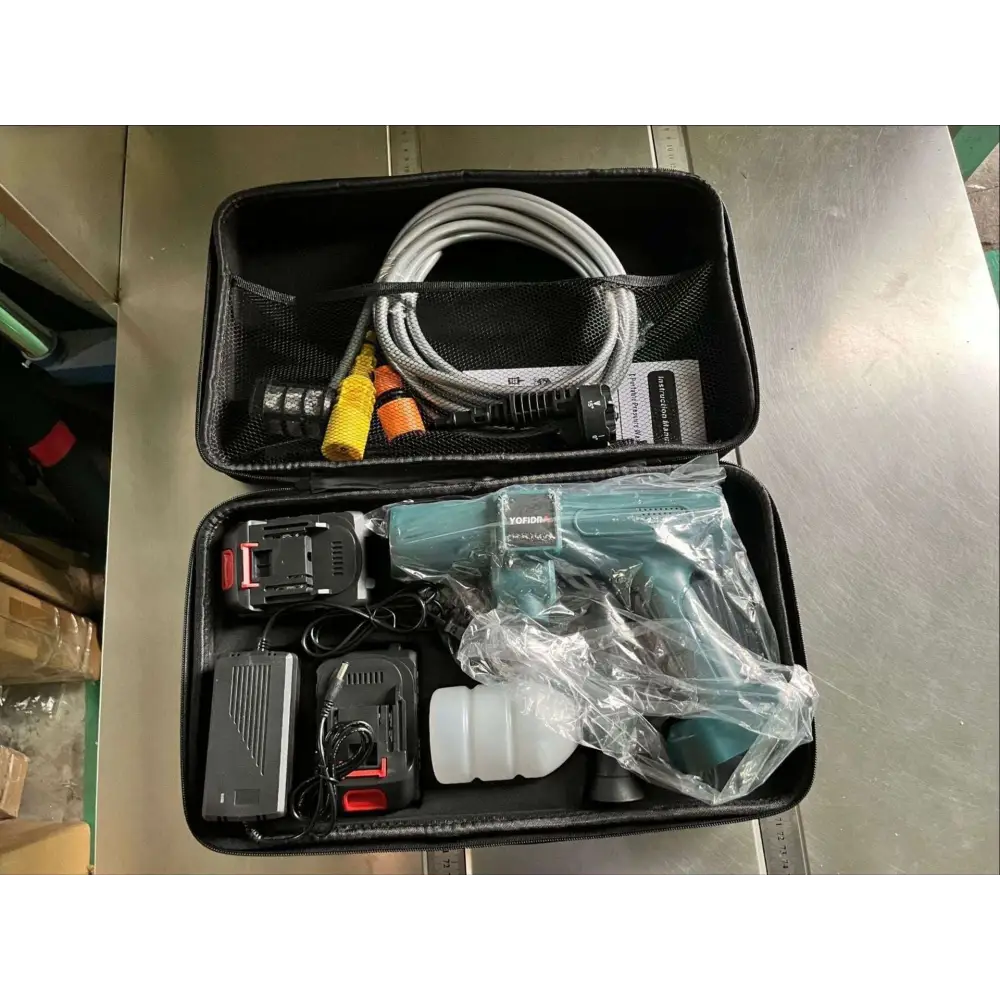 Multifunctional car wash pressure water gun in teal with black accents and clear plastic protective carrying case