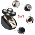 Multifunctional electric shaver with black and gold rotary precision heads and interchangeable attachments for versatile grooming