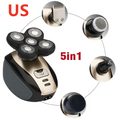Multifunctional electric shaver in black and gold with rotary precision heads and versatile grooming attachments including trimmer and brush heads