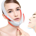 White multifunctional facial lifting face beauty instrument with red directional arrows and black control panel for thinning face beauty