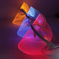 Three multifunctional facial massager led beauty masks in orange blue and pink with sleek black headbands for lifting tool massagers