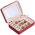 Red leather multifunctional jewelry storage box with built-in mirror and compartments for earrings rings and necklaces