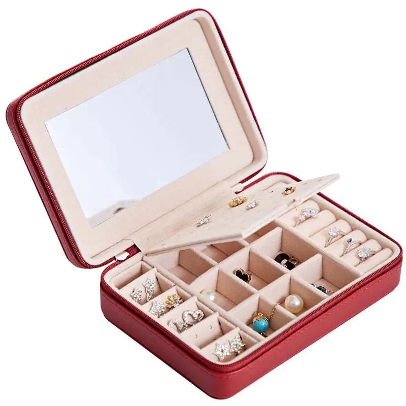 Red leather multifunctional jewelry storage box with built-in mirror and compartments for earrings rings and necklaces