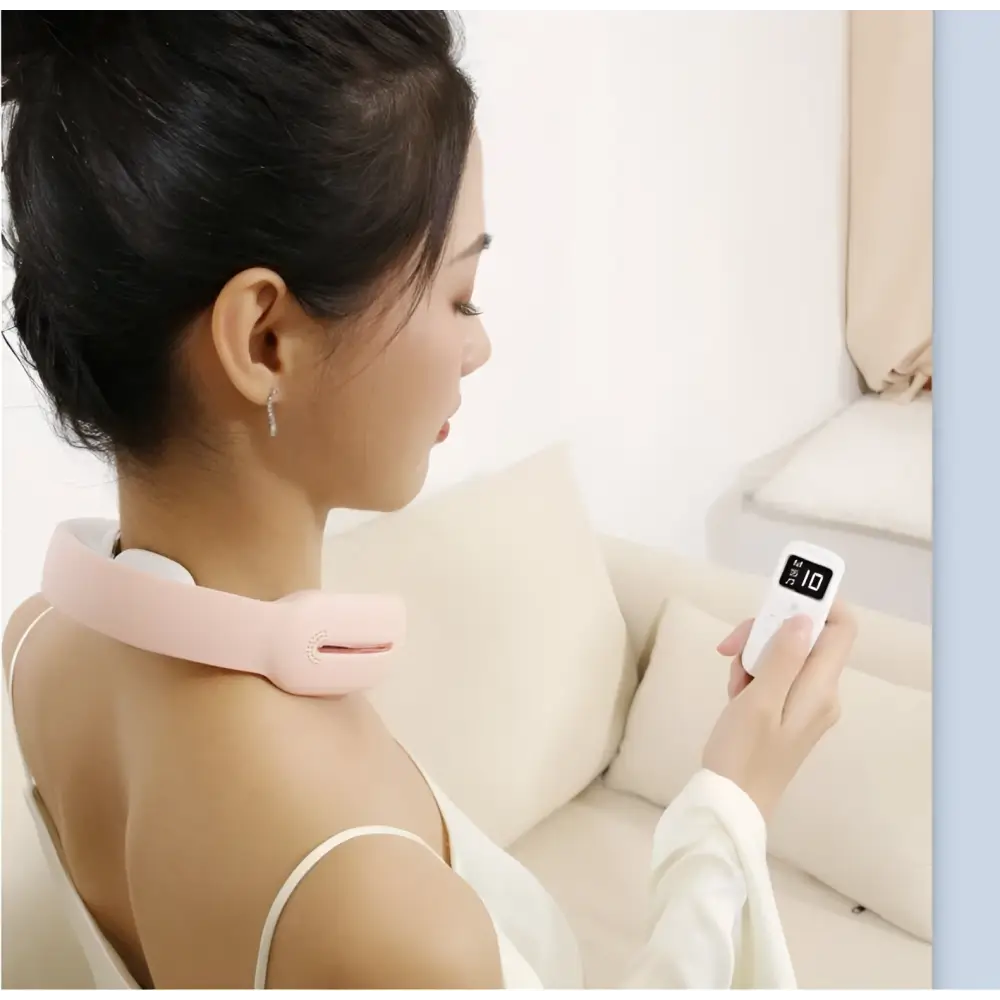 Pink silicone neck massager with white ergonomic multifunctional massage remote control unit for pain relief