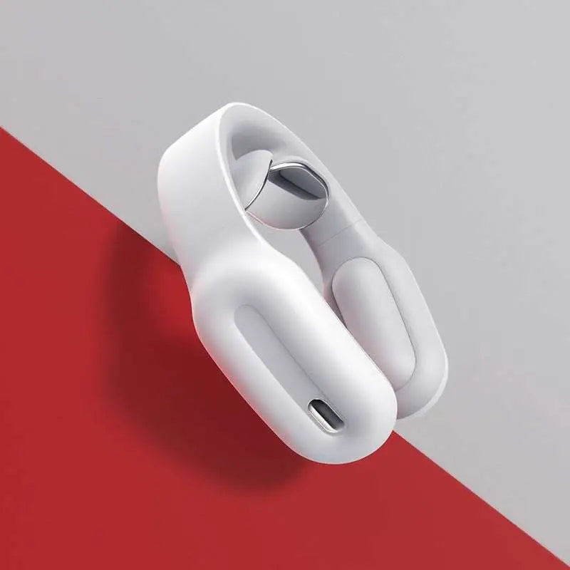 White ergonomic neck massager with sleek curved design and metallic silver accents featuring multifunctional massage remote