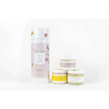 Lizush brand cylindrical container with floral design and white label holding three natural clay mask body skincare products for home spa