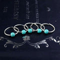Five silver metal ring charms with round turquoise beads for natural lycopose stone decorated bead hair ties