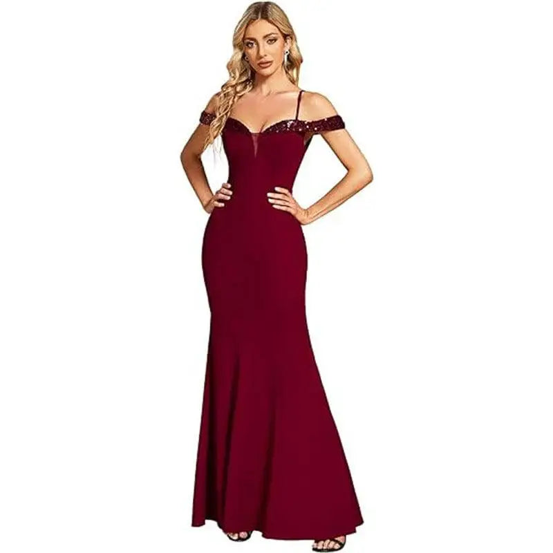 A deep burgundy off-the-shoulder mermaid gown with sequined strap detail, styled as a navy beaded sling evening long dress