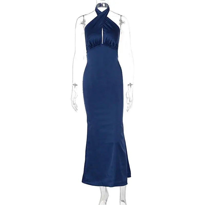 A navy blue elegant backless sleeveless satin gown with a fitted silhouette and subtle side slit