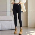 Black form-fitting threaded underwear leggings with a small white brand tag and waist high elastic waistband