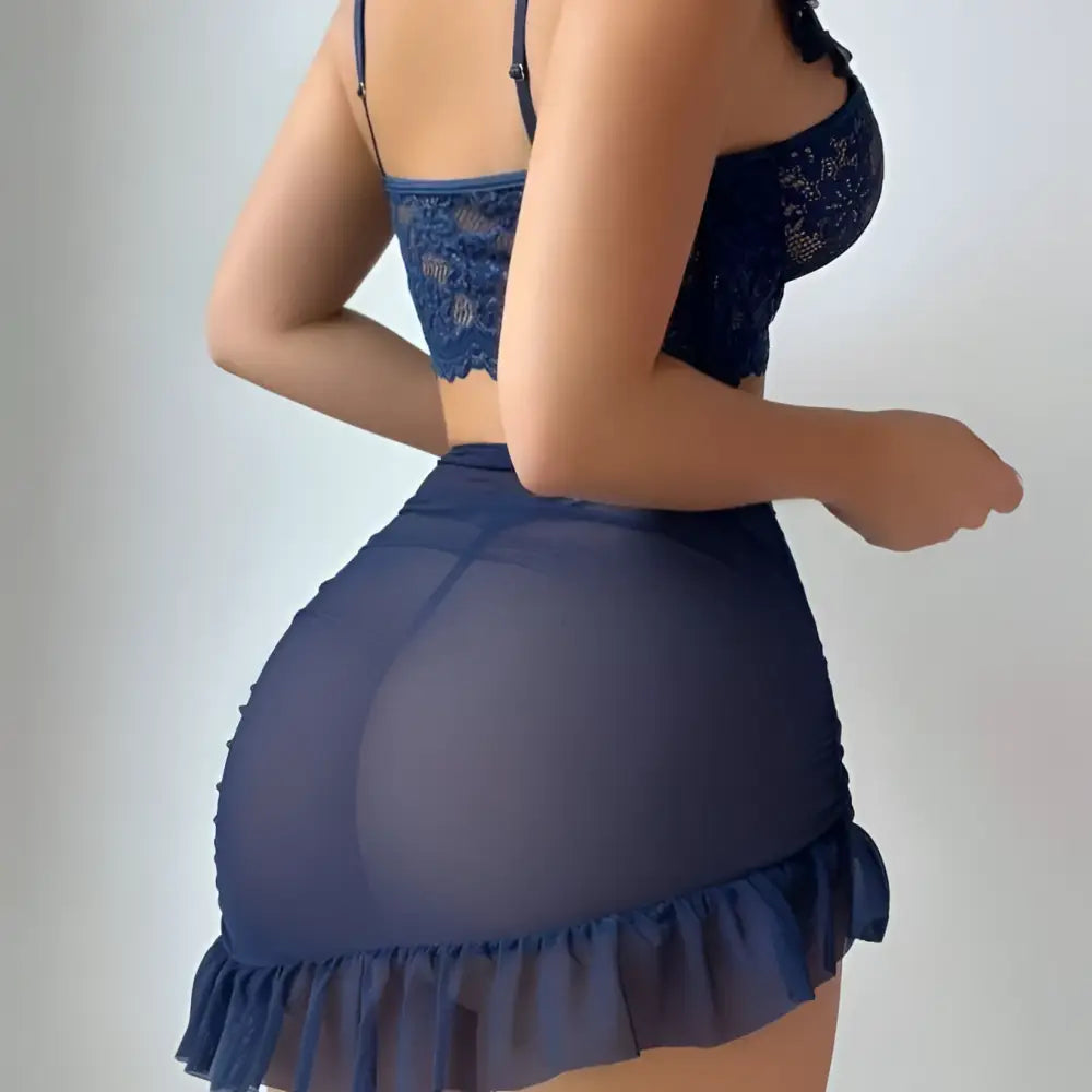 Navy blue lace crop top with thin straps and ruffled hem paired with sheer mesh sexy skirt set