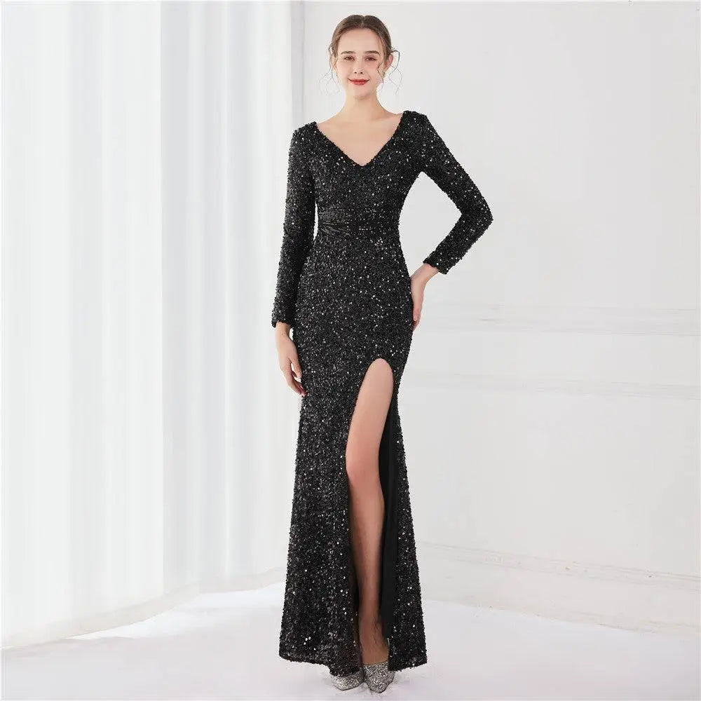 Navy blue long sleeve sequined evening dress with v-neckline, high slit, and mermaid silhouette for formal occasions
