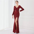 A shimmering burgundy sequined evening dress with long sleeves and high slit for elegant occasions