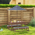 Navy blue outdoor wooden kids picnic table set featuring a navy and white striped patio umbrella with wooden pole