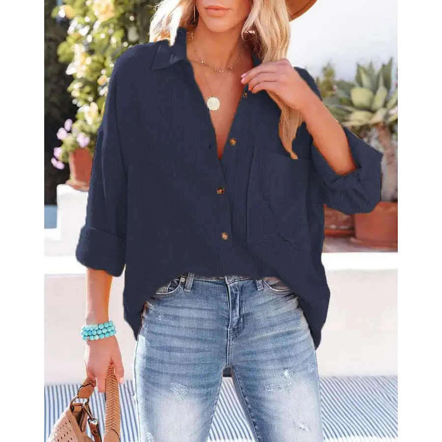 Navy dropped shoulder bat casual long sleeve shirt with subtle vertical pleats and matching brown buttons