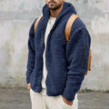 Navy plush hooded fleece jacket with zipper front and brown leather straps for loose casual wear