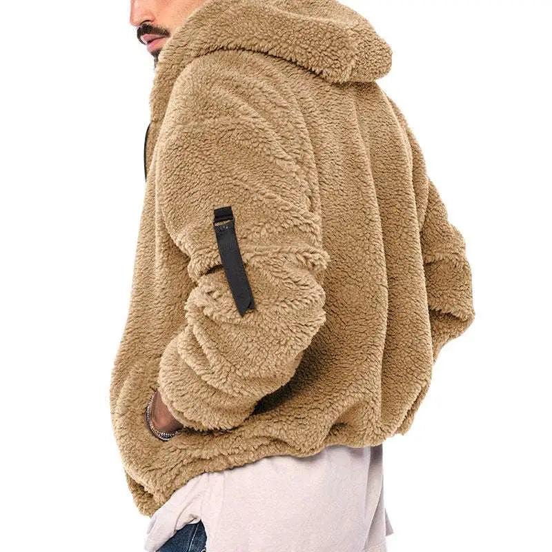 Tan faux fur plush hooded jacket with black patch on sleeve and black zipper for casual wear