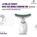 White and silver eterus neck and face led device with curved head and glowing blue light strip for double chin and neck wrinkles