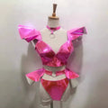 Shiny pink metallic two-piece stage outfit with ruffled shoulder accents and matching choker for neon yellow performance