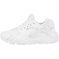 White nike huarache run big kid sneaker with breathable mesh upper heel strap and sleek bootie design