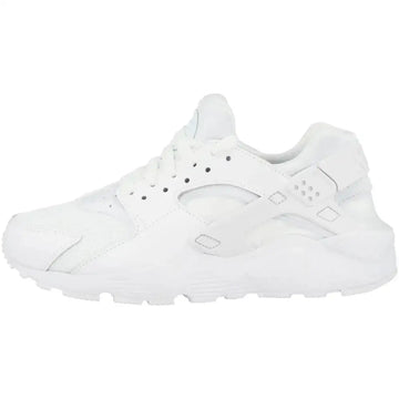 White nike huarache run big kid sneaker with breathable mesh upper heel strap and sleek bootie design