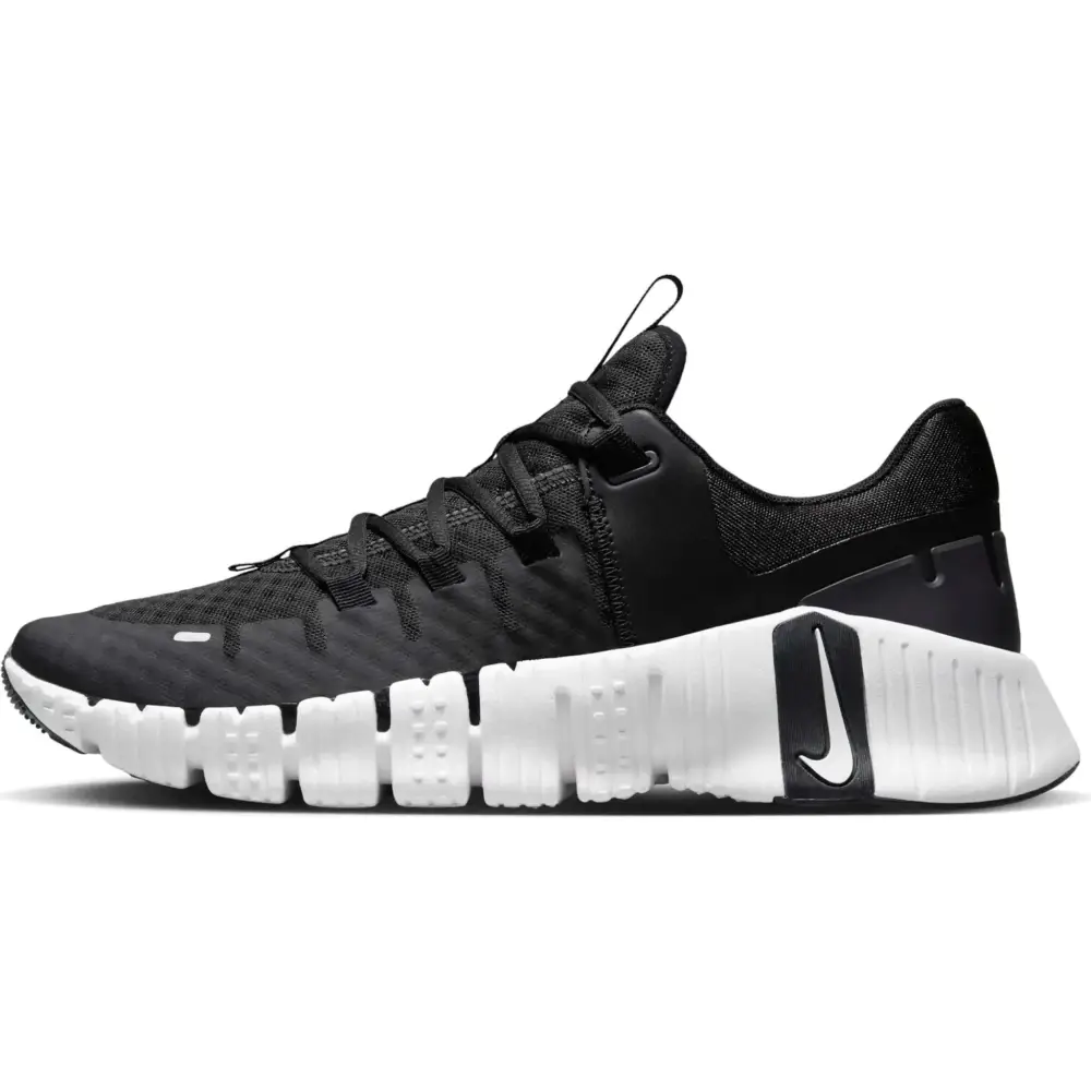 Black nike mens sneaker free 5.0 with white midsole and textured rubber outsole featuring the swoosh logo