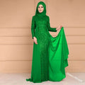 A vibrant emerald green abaya with a sequined bodice and matching hijab alongside a noble elegant slim purple sequined gown with sheer overlay