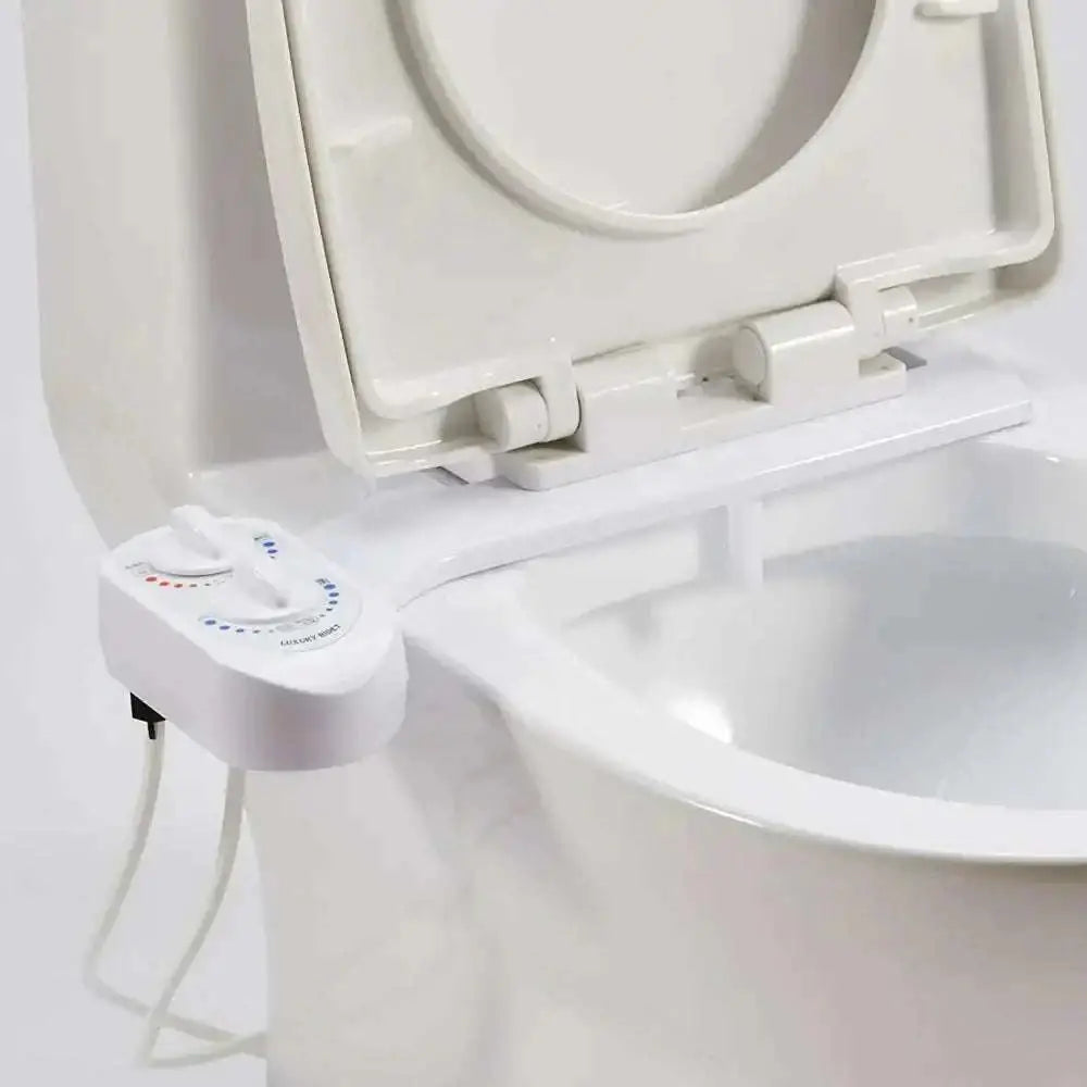 White plastic non-electric bidet with adjustable nozzle and control dial for water pressure regulation and spray functions