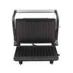Black nonstick electric grill and steak maker with stainless steel handle and ribbed grilling plates for even cooking