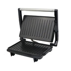 Black and silver nonstick electric grill and steak maker with ribbed grilling plates for even cooking and searing