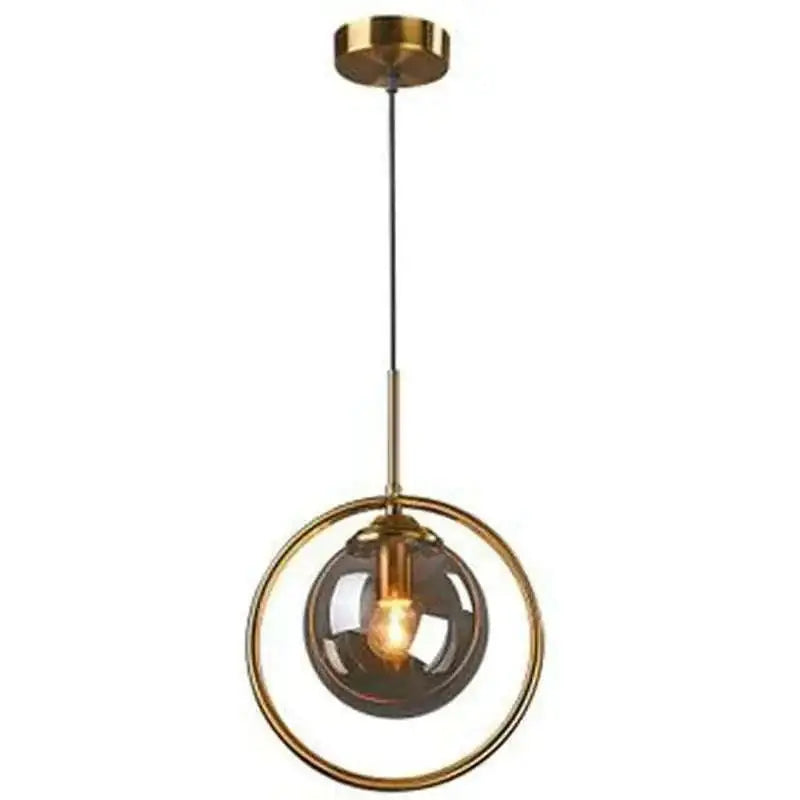Nordic modern minimalist glass pendant light with gold-toned metal frame and dark smoked glass globe encircling bulb