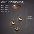 Nordic modern minimalist glass pendant light with three smoked glass globes and gold-toned metal rings ceiling lamp