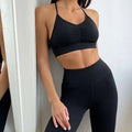 Black stretchy sports bra with ruched front and thin straps from nude sensation waist gathering two piece yoga set