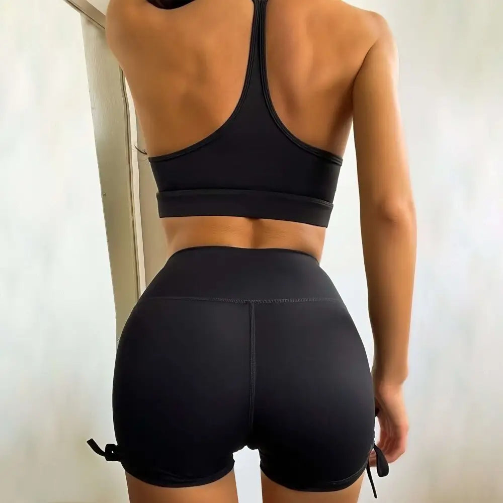 Black high-waisted athletic shorts with side ties from nude sensation waist gathering two piece yoga set