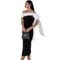 Black off-shoulder color matching elegant cocktail dress with a flowing white fabric bow draped over one shoulder