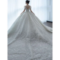 Off shoulder lace wedding dress in white featuring lace material and a voluminous skirt perfect for bridal wear