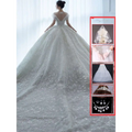 Off shoulder lace wedding dress in white featuring a voluminous skirt and delicate lace detailing perfect for brides