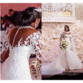 White lace long sleeves mermaid wedding dress with beaded detailing and sheer fabric for elegant bridal wear