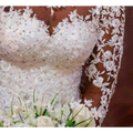 Off the shoulder long sleeves mermaid white wedding dress with intricate lace floral embroidery and sparkling beadwork