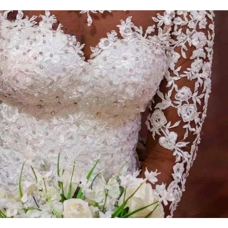 Off the shoulder long sleeves mermaid white wedding dress with intricate lace floral embroidery and sparkling beadwork