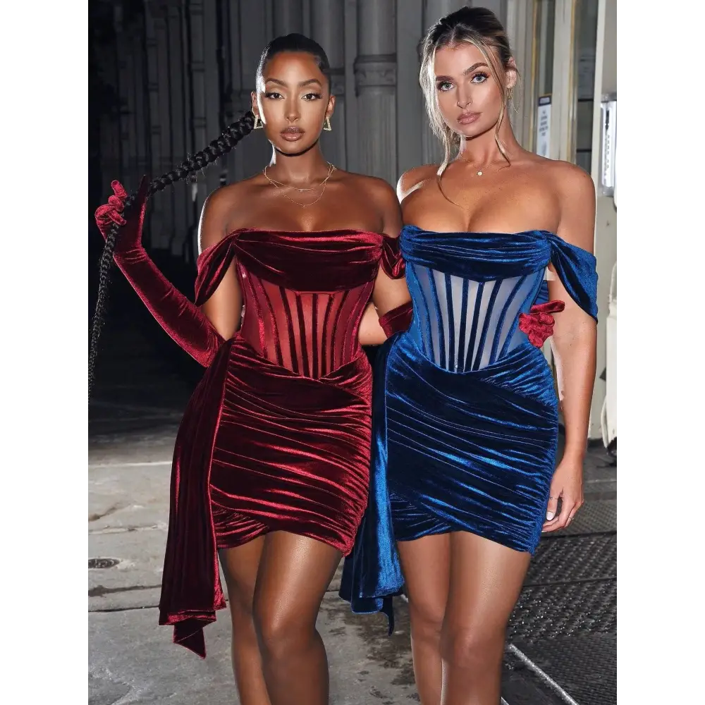 A pair of off the shoulder velvet sexy mini dresses in deep red and royal blue with corset-style front panels