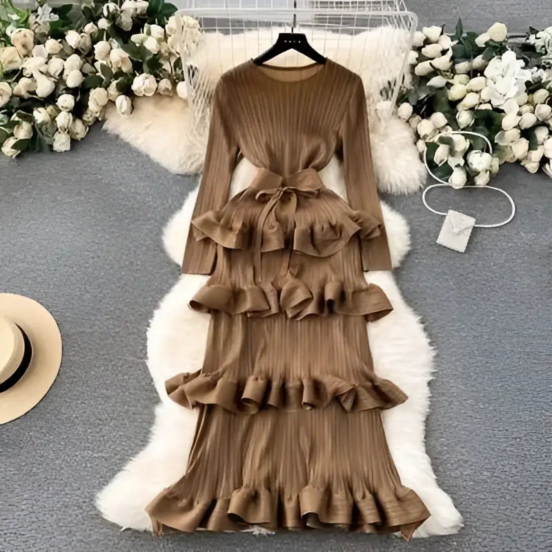 Olive green cake heavy industry pleated long dress with ribbed fabric ruffled layers and matching belt in brown