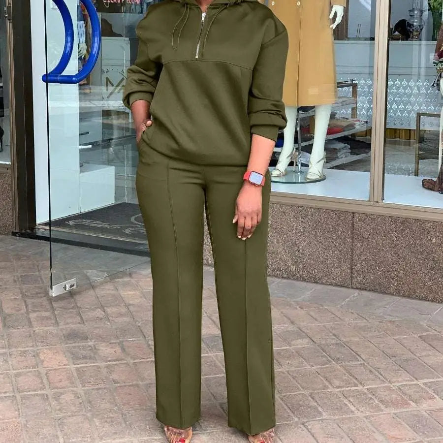 Olive green solid color loose hooded sweatsuit featuring a zippered top and wide-leg pants for casual wear